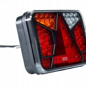 Lampa tylna uniwersalna LED 12-36V, lewa z trójkątem odblaskowym, 7-funkcyjna z oświetleniem tablicy rej., przewód o długości 1 m.